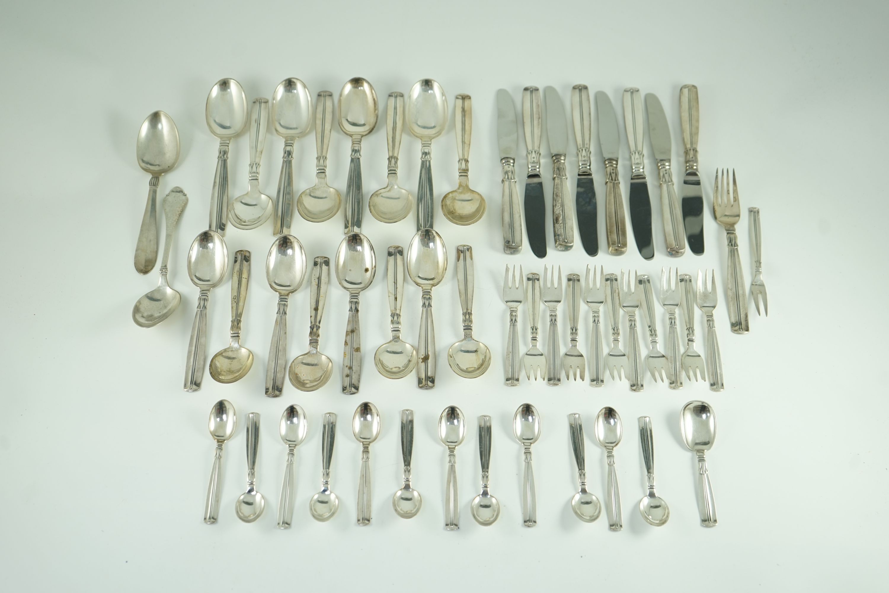 A mid 20th century harlequin part canteen of Danish 830 standard flatware by Broderne, W & S Sorensen